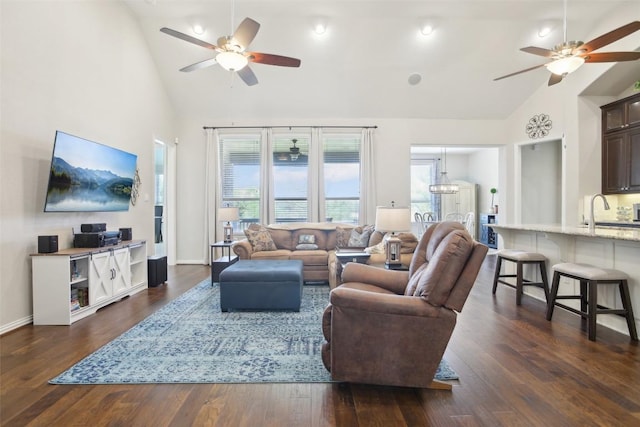 3036 Margarita Loop, Round Rock, TX 78665 - living room with a ceiling fan, high vaulted ceiling, and dark wood-style floors