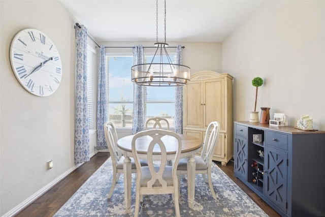 3036 Margarita Loop, Round Rock, TX 78665 - dining area featuring a chandelier and dark wood-style flooring