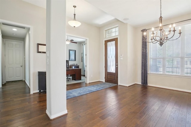entryway with baseboards and dark wood-style floors