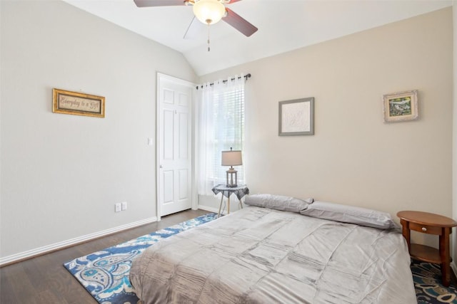 3036 Margarita Loop, Round Rock, TX 78665 - bedroom featuring lofted ceiling, wood finished floors, and a ceiling fan