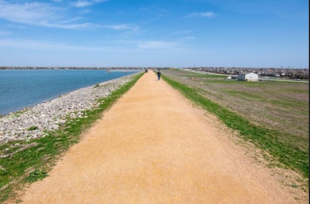 view of property's community featuring a water view