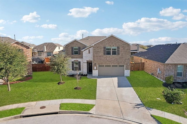traditional home featuring a front lawn, a garage, concrete driveway, and fence