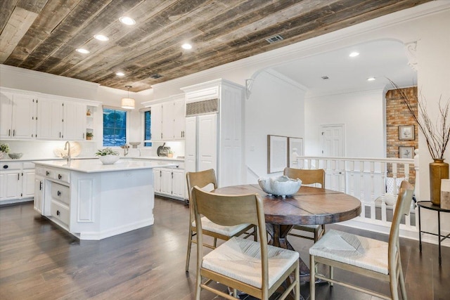 504 Konstanty Cir, Austin, TX 78746 - dining room with wooden ceiling, recessed lighting, dark wood finished floors, and ornamental molding