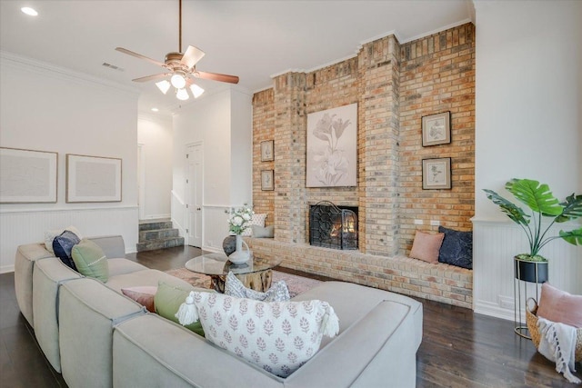 504 Konstanty Cir, Austin, TX 78746 - living area featuring dark wood-style floors, a fireplace, ceiling fan, recessed lighting, and wainscoting