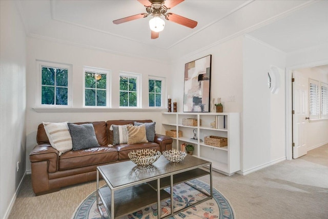 504 Konstanty Cir, Austin, TX 78746 - carpeted living room featuring baseboards, crown molding, and a ceiling fan