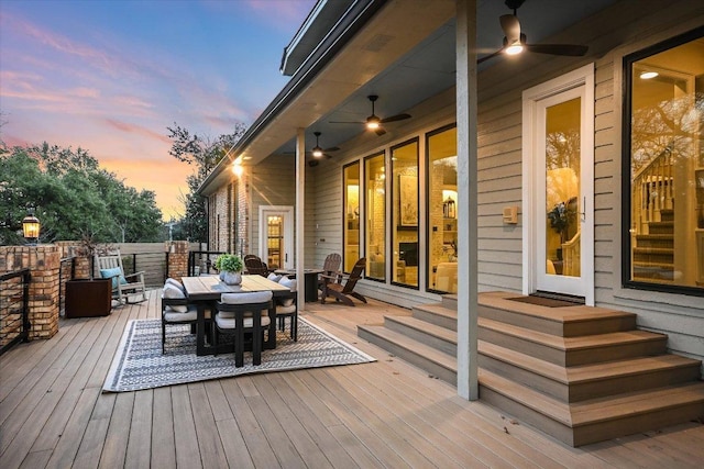504 Konstanty Cir, Austin, TX 78746 - wooden terrace featuring outdoor dining area, ceiling fan, and entry steps