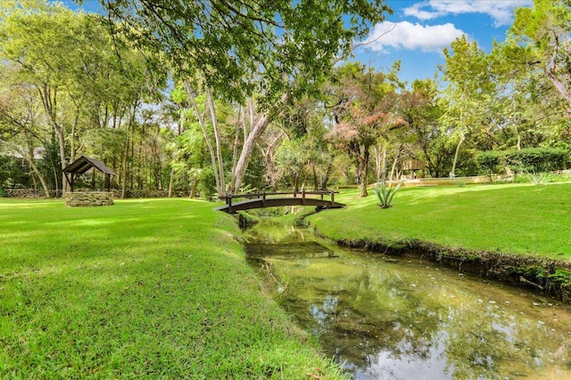 504 Konstanty Cir, Austin, TX 78746 - view of grassy yard with a gazebo and view of wooded area