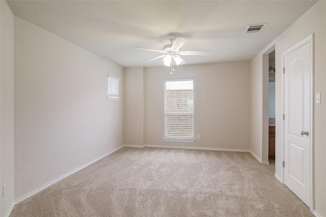 19803 Mallard Pond Trl, Pflugerville, TX 78660 - empty room with light carpet and a ceiling fan