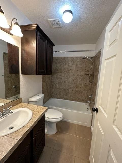 11708 Bittern Holw, Austin, TX 78758 - bathroom with tile patterned floors, vanity, a textured ceiling, toilet, and shower / washtub combination