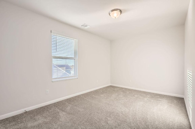 303 Elm Branch Trl, Taylor, TX 76574 - carpeted spare room featuring baseboards
