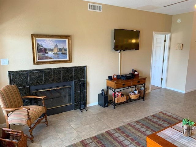 3404 American Dr Unit 2202, Lago Vista, TX 78645 - living room with a tile fireplace and baseboards