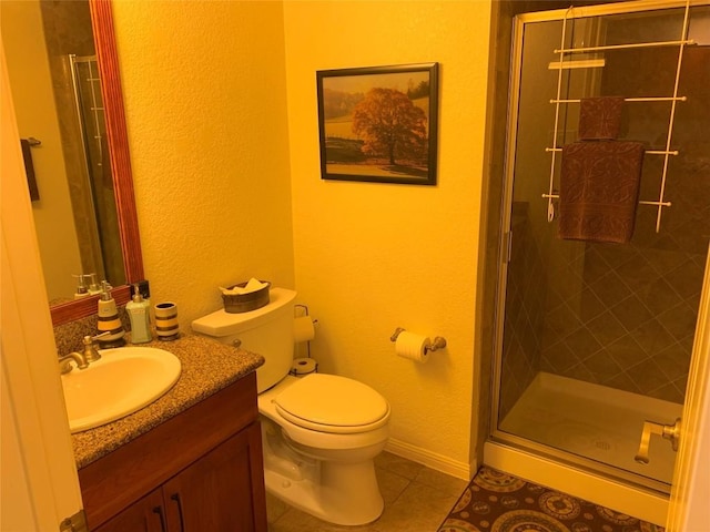 3404 American Dr Unit 2202, Lago Vista, TX 78645 - bathroom featuring vanity, tile patterned flooring, a stall shower, and a textured wall