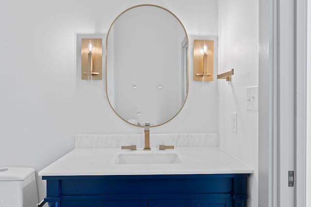 2450 Wickersham Ln Unit 2013, Austin, TX 78741 - bathroom featuring vanity and toilet