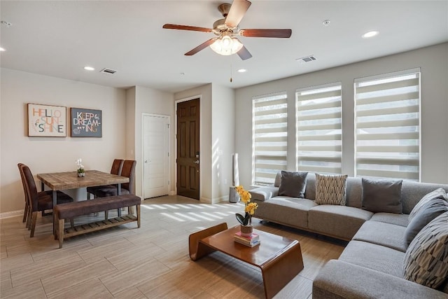 13800 Lyndhurst St Unit 325, Austin, TX 78717 - living room featuring a ceiling fan, baseboards, light wood-style flooring, and recessed lighting