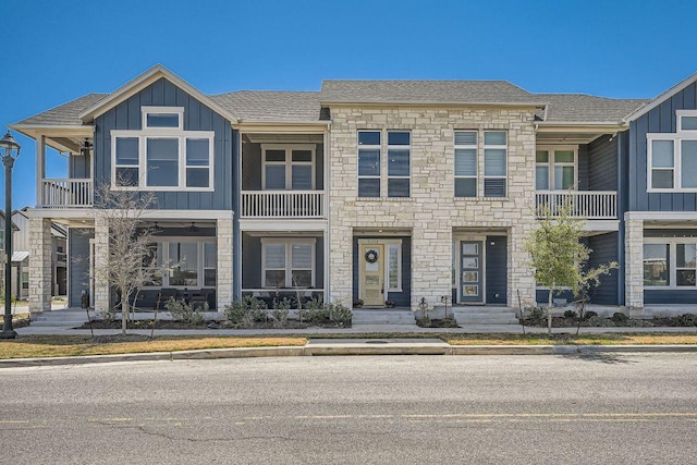 3213 Zach Scott St, Austin, TX 78723 - multi unit property with a balcony, board and batten siding, and stone siding
