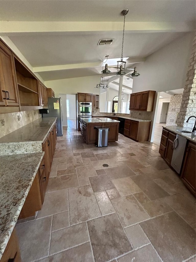 712 Rolling Green Dr, Lakeway, TX 78734 - kitchen with tasteful backsplash, open shelves, stainless steel appliances, visible vents, and stone tile flooring