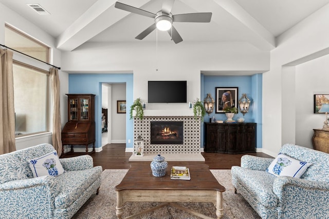 390 Double L Dr, Dripping Springs, TX 78620 - living room with baseboards, wood finished floors, a tiled fireplace, and ceiling fan