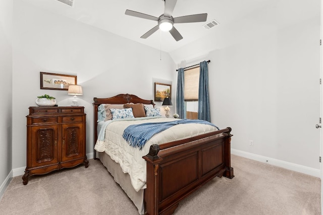 bedroom featuring baseboards, visible vents, light carpet, and lofted ceiling