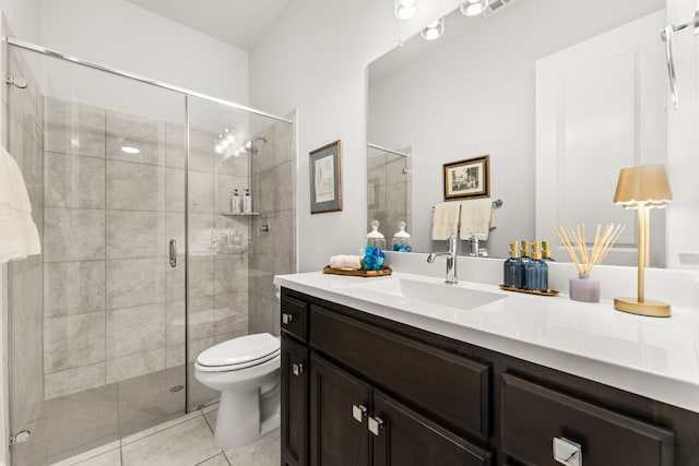390 Double L Dr, Dripping Springs, TX 78620 - bathroom with vanity, toilet, a stall shower, and tile patterned flooring