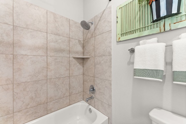 bathroom with toilet and tub / shower combination