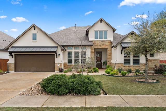 view of front of property featuring stucco siding, a standing seam roof, a shingled roof, stone siding, and a front lawn