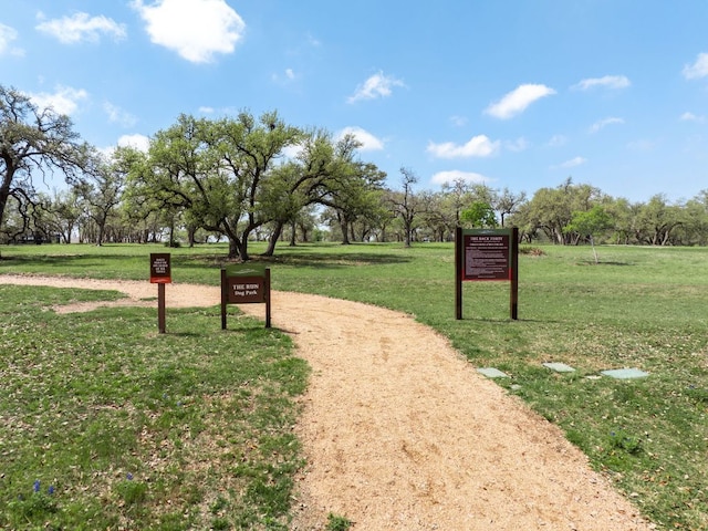 view of community featuring a yard