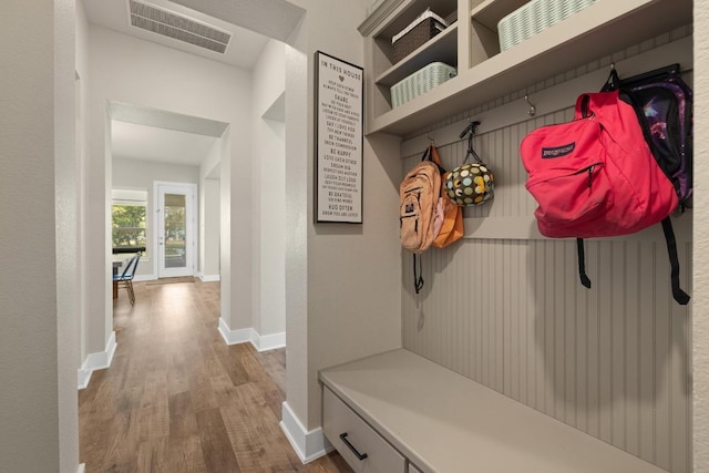 1924 Portobello Rd, Leander, TX 78641 - mudroom with wood finished floors and baseboards