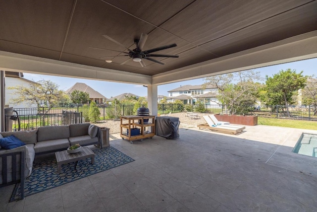 1924 Portobello Rd, Leander, TX 78641 - fenced backyard with an outdoor living space, a patio, ceiling fan, and a grill