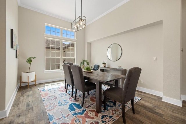 1924 Portobello Rd, Leander, TX 78641 - dining room with crown molding, wood finished floors, and a chandelier