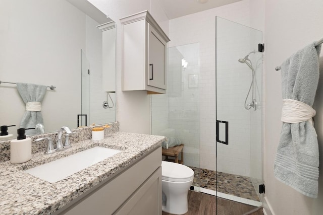 1924 Portobello Rd, Leander, TX 78641 - full bath with vanity, a shower stall, and wood finished floors