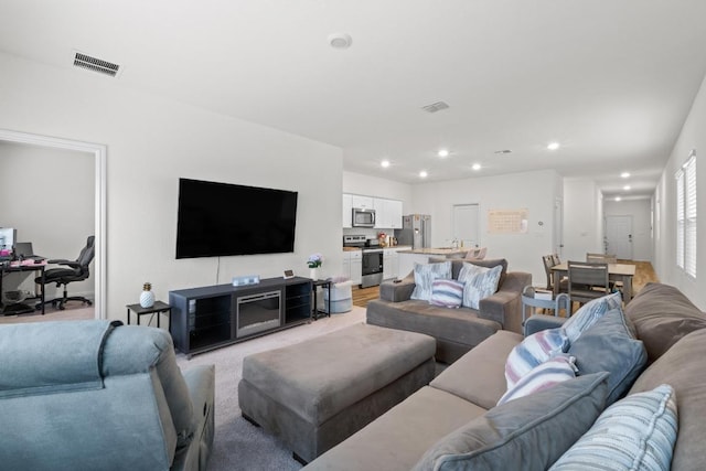 412 Gemsbok Rd, Hutto, TX 78634 - living room featuring recessed lighting