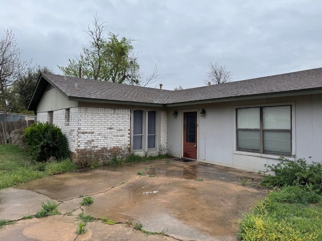 2100 Heights Blvd, Taylor, TX 76574 - view of front of property with roof with shingles and a patio