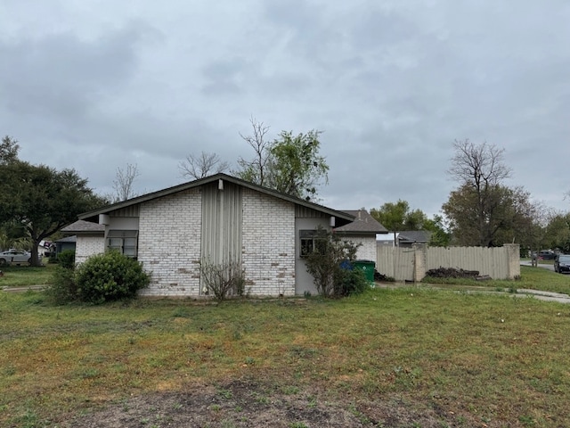 2100 Heights Blvd, Taylor, TX 76574 - view of home's exterior with brick siding