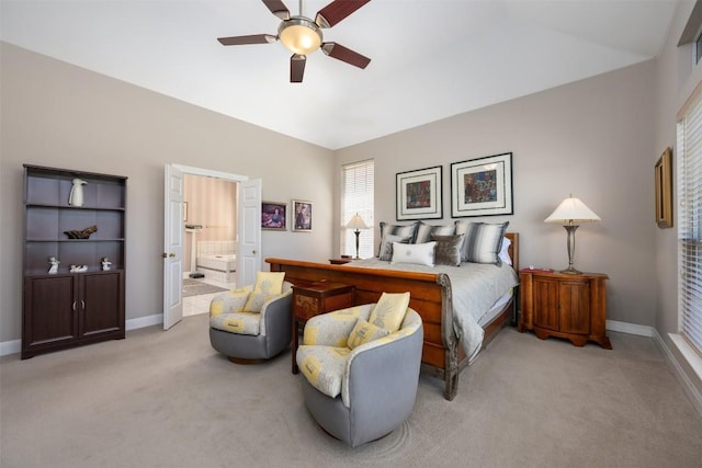6 Radnor Dr, Austin, TX 78738 - bedroom with light colored carpet, baseboards, lofted ceiling, ensuite bathroom, and ceiling fan
