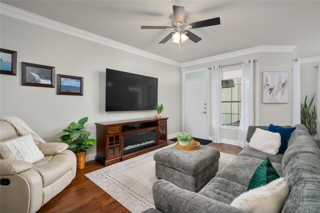 7701 Rialto Blvd Unit 617, Austin, TX 78735 - living area featuring ornamental molding, ceiling fan, baseboards, and wood finished floors