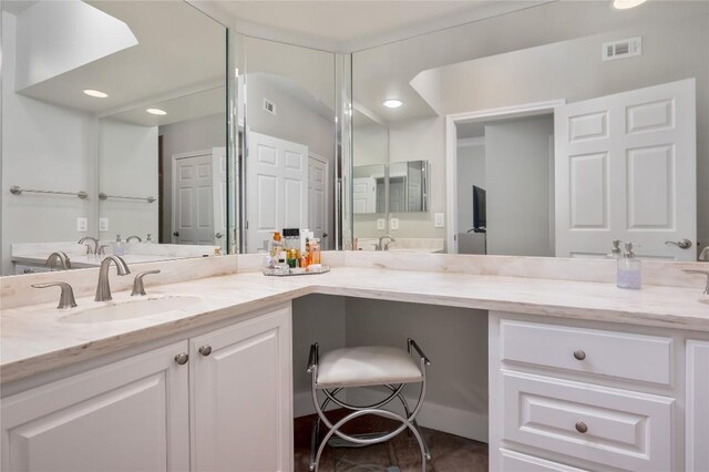 7701 Rialto Blvd Unit 617, Austin, TX 78735 - bathroom with double vanity and recessed lighting
