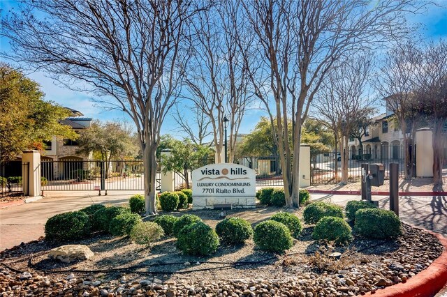 7701 Rialto Blvd Unit 617, Austin, TX 78735 - community sign with a gate