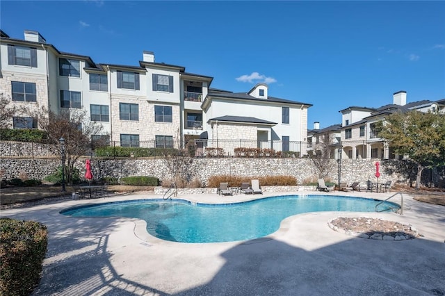 7701 Rialto Blvd Unit 617, Austin, TX 78735 - community pool featuring a patio area