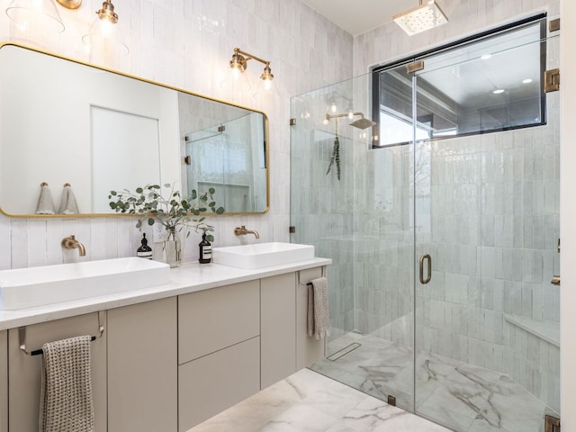1510 Bellaire Dr, Austin, TX 78741 - bathroom featuring a stall shower and double vanity