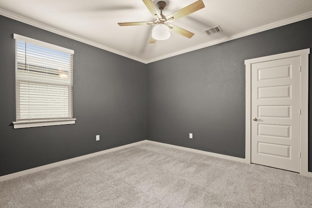7800 Linnie Ln, Austin, TX 78724 - unfurnished room with carpet flooring, ceiling fan, and ornamental molding