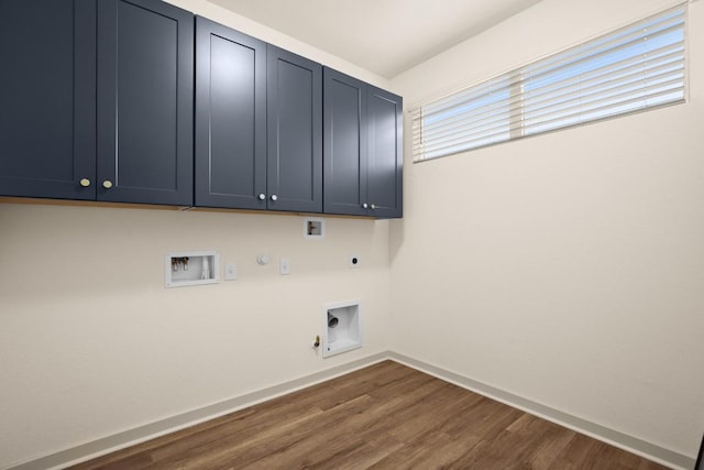 7800 Linnie Ln, Austin, TX 78724 - laundry area featuring hookup for an electric dryer, gas dryer hookup, cabinet space, hookup for a washing machine, and dark wood-type flooring