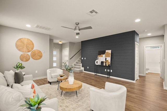 7800 Linnie Ln, Austin, TX 78724 - living room with stairway, recessed lighting, wood finished floors, and ceiling fan