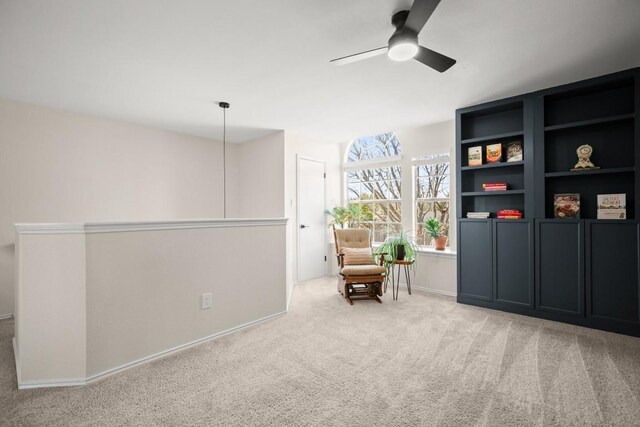 1302 Rambling Trl, Cedar Park, TX 78613 - living area featuring carpet, a ceiling fan, and baseboards