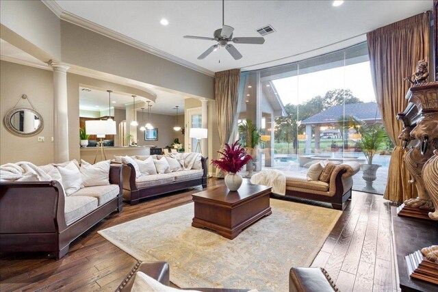 1317 Jack Nicklaus Cir, Salado, TX 76571 - living room featuring wood-type flooring, decorative columns, and ornamental molding