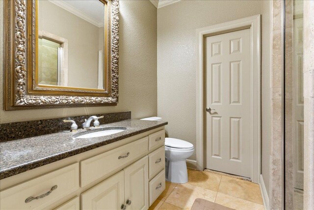 1317 Jack Nicklaus Cir, Salado, TX 76571 - full bathroom with tile patterned floors, toilet, vanity, ornamental molding, and a textured wall