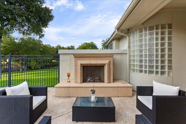 1317 Jack Nicklaus Cir, Salado, TX 76571 - view of patio / terrace with an outdoor living space with a fireplace and fence