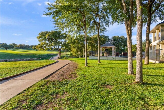 1317 Jack Nicklaus Cir, Salado, TX 76571 - surrounding community featuring fence, a gazebo, and a yard
