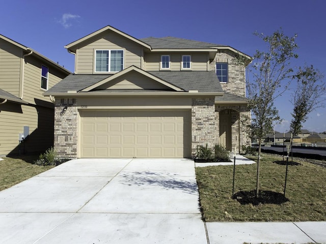 12110 Stoneridge Gap Ln, Manor, TX 78653 - traditional home featuring brick siding, concrete driveway, a garage, and a shingled roof