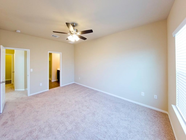 12110 Stoneridge Gap Ln, Manor, TX 78653 - unfurnished bedroom with light colored carpet, baseboards, and ceiling fan