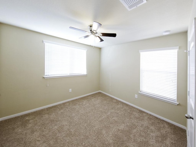 12110 Stoneridge Gap Ln, Manor, TX 78653 - spare room featuring ceiling fan, carpet floors, baseboards, and a smoke detector